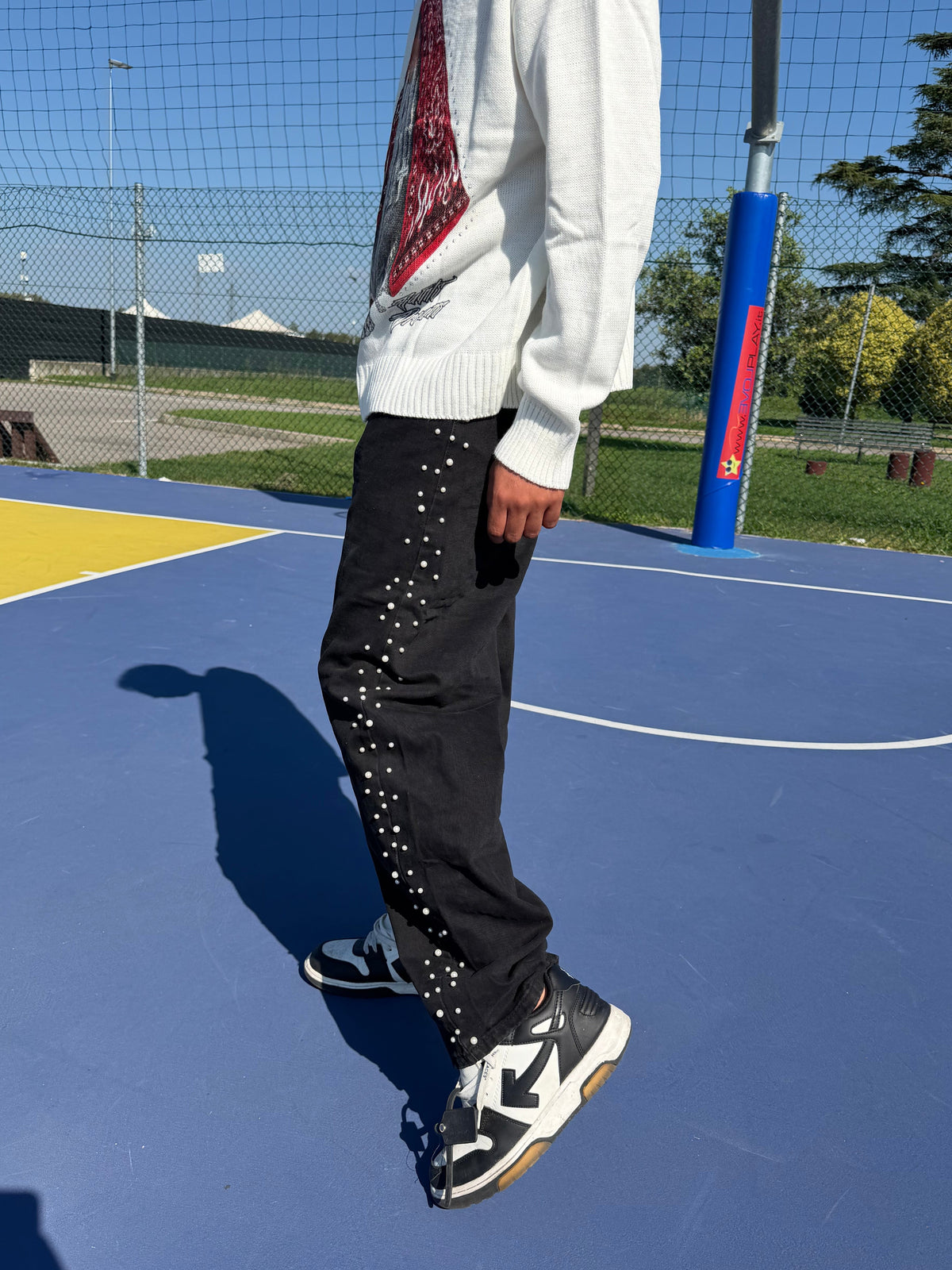 JEANS NERO CON STRASS