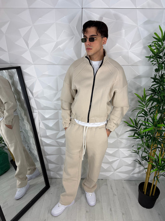 Tuta beige con zip