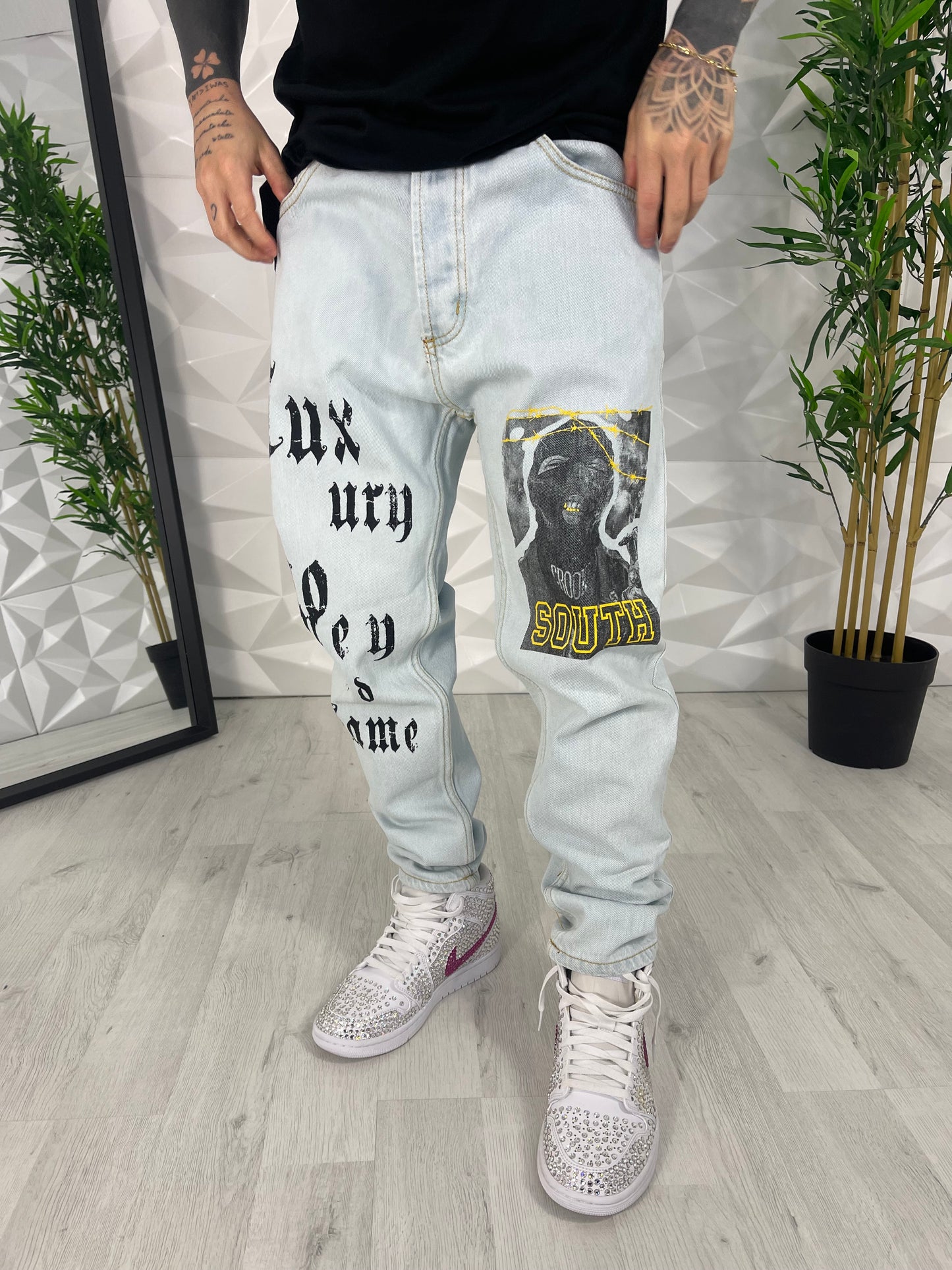 Jeans con stampa